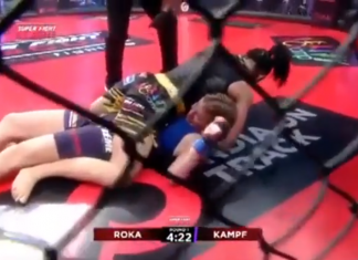 VIDEO. Un antrenor a intrat în octogon pentru a-și salva luptătoarea! VIDEO. Un antrenor a intrat în octogon pentru a-și salva luptătoarea!