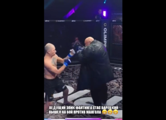 VIDEO. Luptă de MMA între un luptător și un bătrân echipat în palton de piele cu lanț de aur la gât VIDEO. Luptă de MMA între un luptător și un bătrân echipat în palton de piele cu lanț de aur la gât